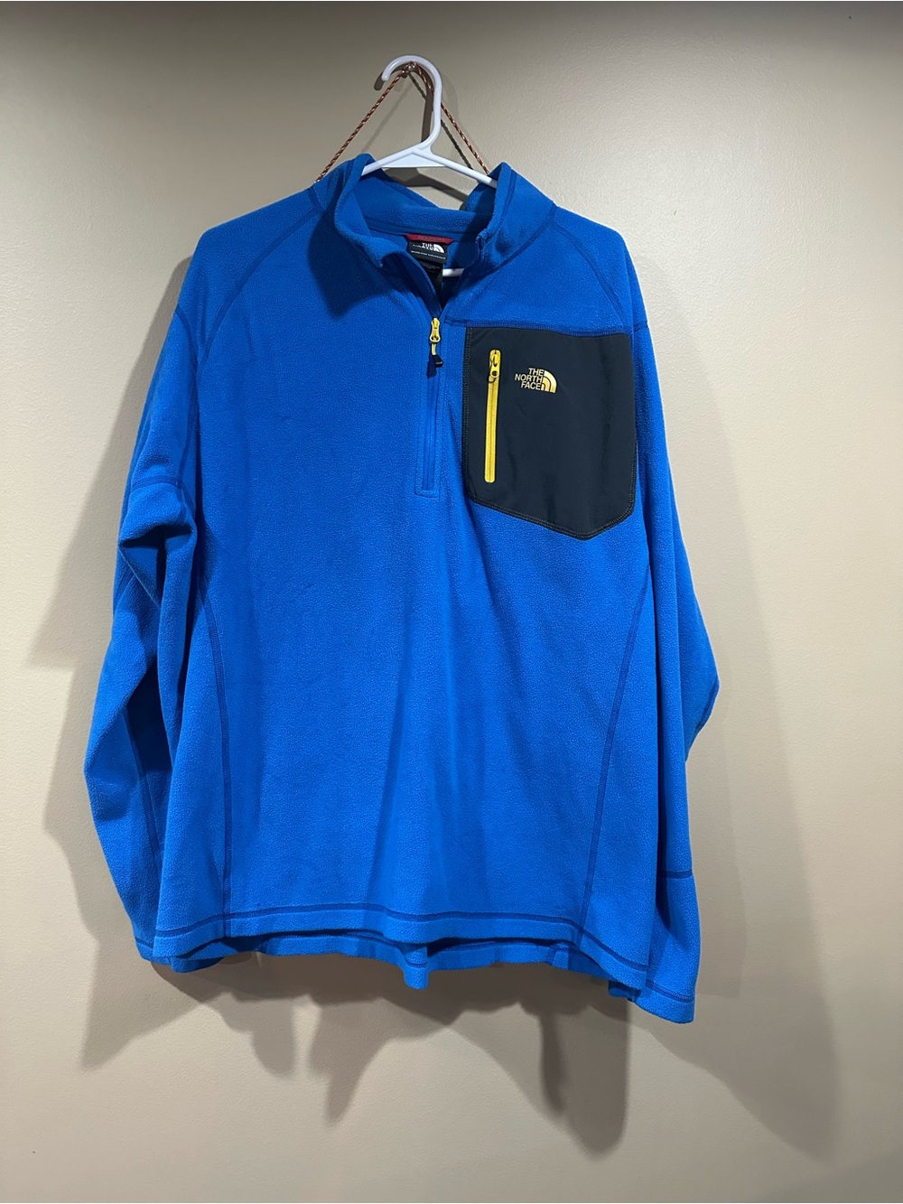 The North Face Blue Fleece Pullover with Black Chest Pocket and Yellow Zipper - Picture 1 of 1